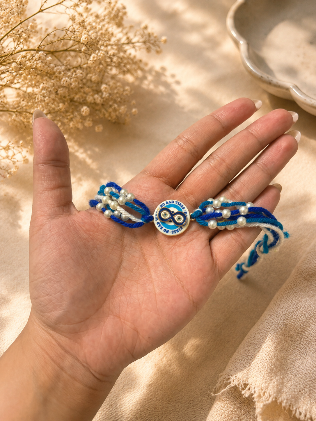 Evil eye spinner rakhi