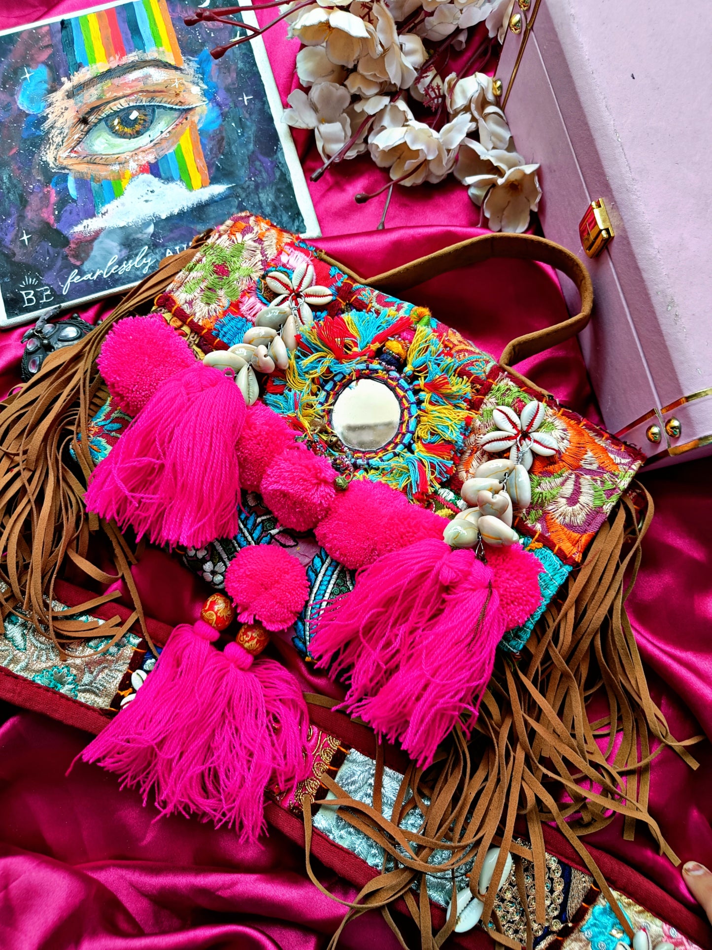 Boho bag with pink pompoms